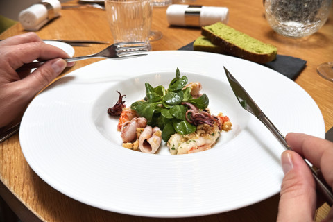 Sautéed red prawns and calamari, wild garlic butter, hazelnuts, cognac