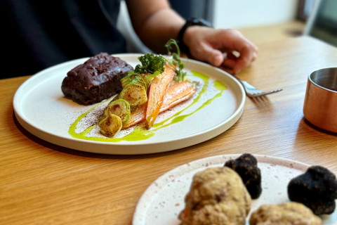 Slowly cooked beef rib, potato purée, glazed carrot, truffle sauce with duck foie gras